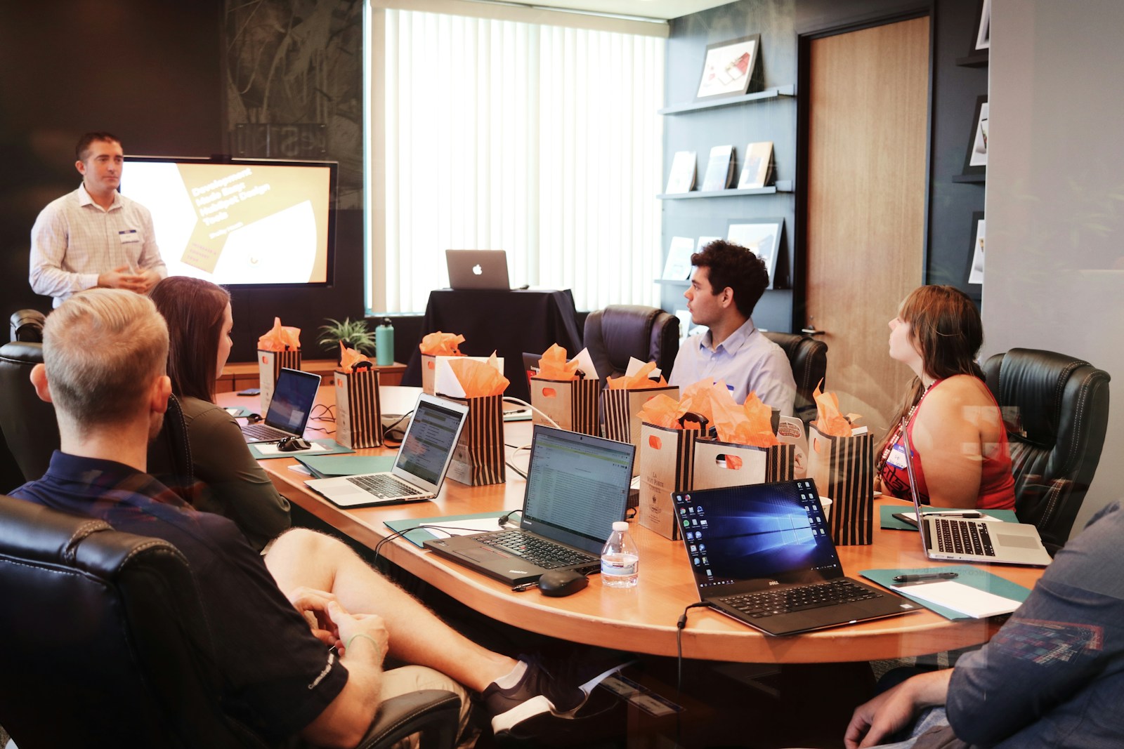 Client review session presenting learning analytics findings to academic leadership